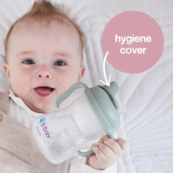 Baby training cup with anti-spill spout