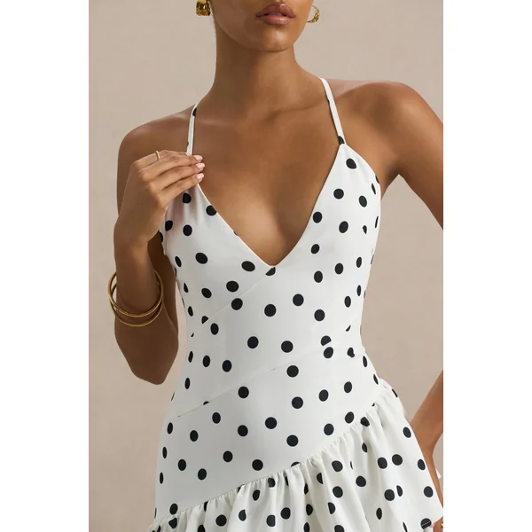 Bogota | Robe longue à pois avec décolleté plongeant volants et fente haute frontale