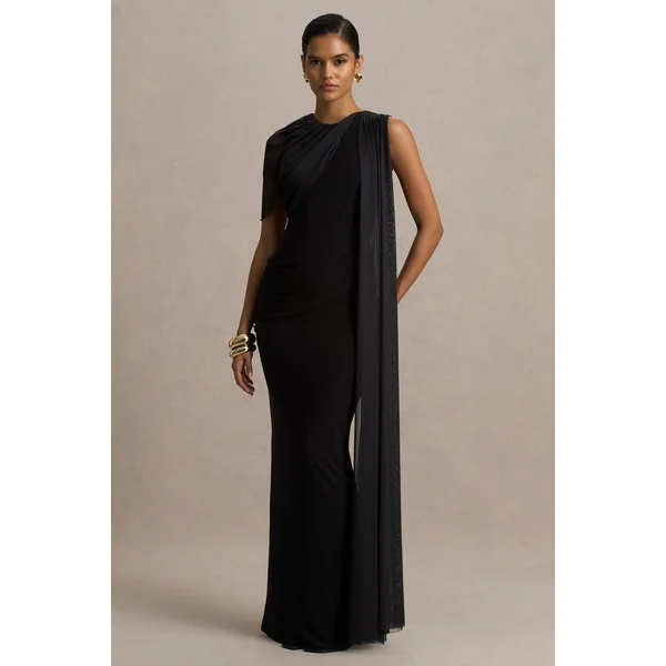 Brenda | Robe longue en maille noire avec manche cape et ceinture