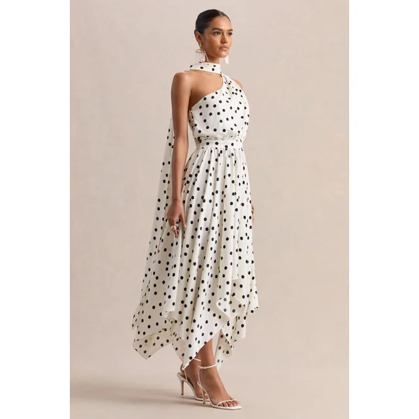 Caluna | Robe mi-longue en satin à pois noirs et blancs à encolure asymétrique avec détail foulard