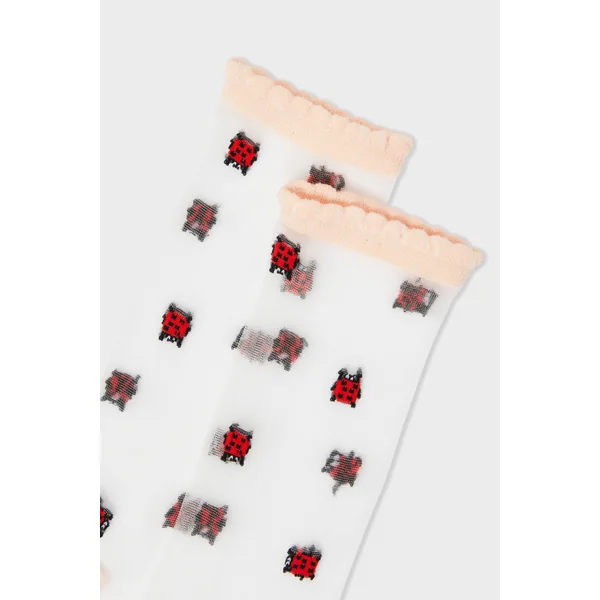 Chaussettes transparentes à motifs coccinelles Coucou Suzette