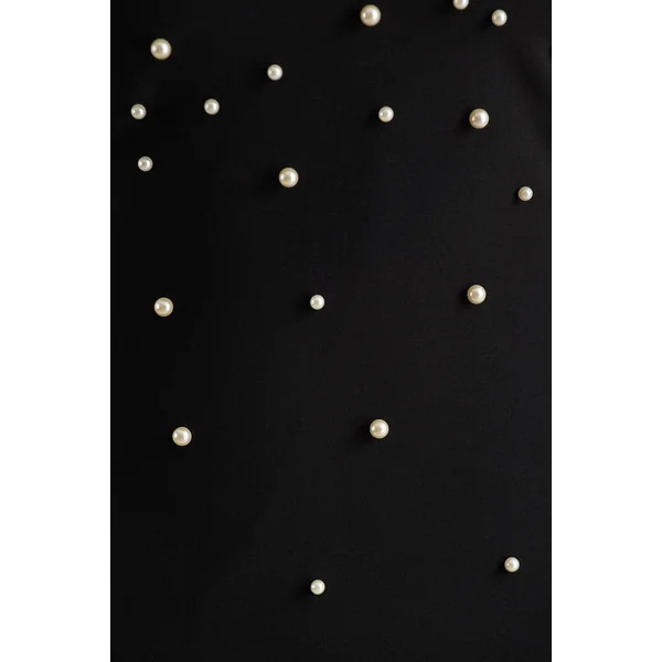 Dani | Robe longue noire à encolure nouée et ornements perlés