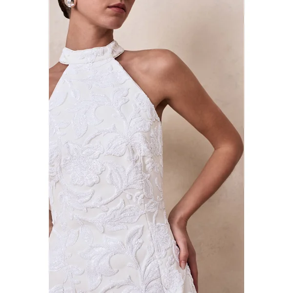 Dreamer | Mini-robe blanche en dentelle à encolure halter avec détail de rosette oversize