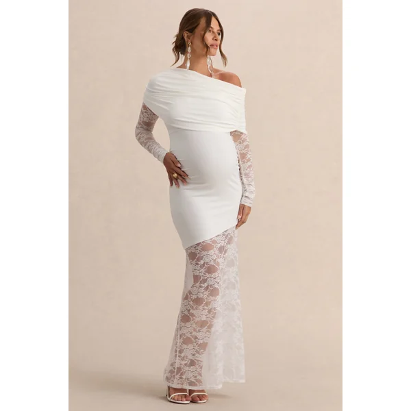 Giuliana | Robe longue de grossesse blanche à encolure asymétrique avec détails en dentelle