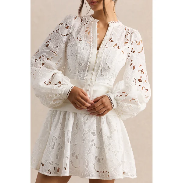 Helena | Mini-robe blanche à encolure ronde avec manches bouffantes et jupe plissée