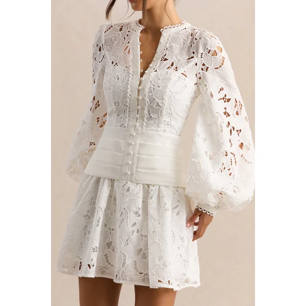 Helena | Mini-robe blanche à encolure ronde avec manches bouffantes et jupe plissée