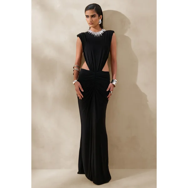 Imelda | Robe longue noire à encolure bateau avec découpes sur le corps