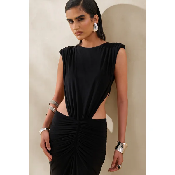 Imelda | Robe longue noire à encolure bateau avec découpes sur le corps