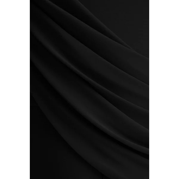 Labina | Combinaison noire avec décolleté plongeant et manches cape