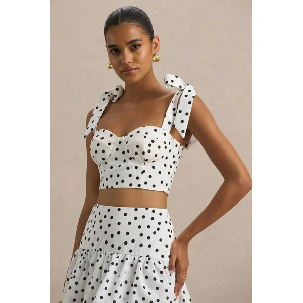 Lumen | Top corset blanc à pois avec décolleté cœur et bretelles à nœuds