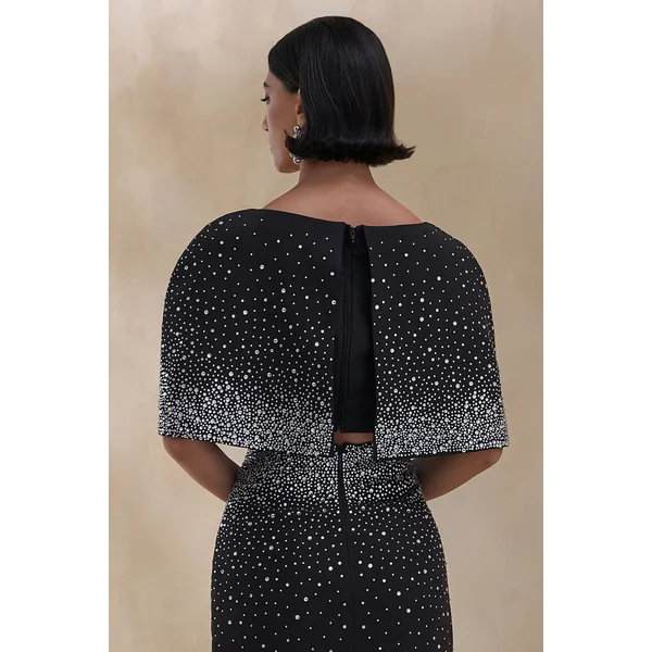Luxy | Crop top noir orné à encolure bateau avec manches cape