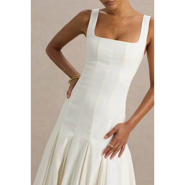 Magnolia | Robe midi blanche à décolleté arrondi taille basse et détails à volants