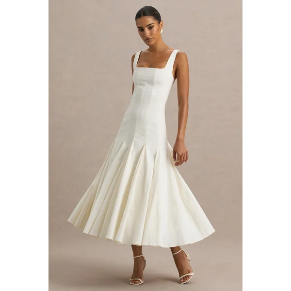 Magnolia | Robe midi blanche à décolleté arrondi taille basse et détails à volants