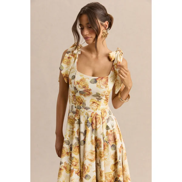 Mena | Robe mi-longue à imprimé de roses jaune citron avec encolure carrée et bretelles à nœuds