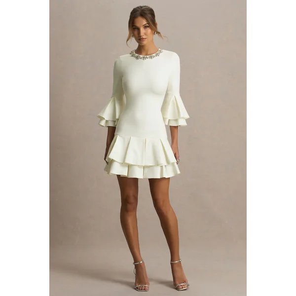 Mirna | Mini-robe crème à encolure ras-du-cou avec manches évasées et détails volantés