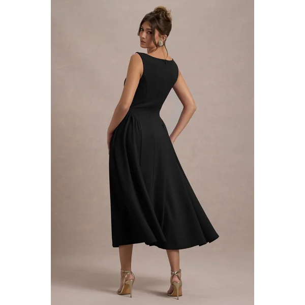 Muriel | Robe mi-longue noire à encolure bateau et jupe volumineuse