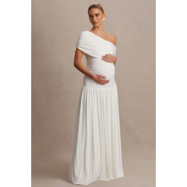 Noah | Robe longue de maternité blanche à encolure asymétrique et taille basse