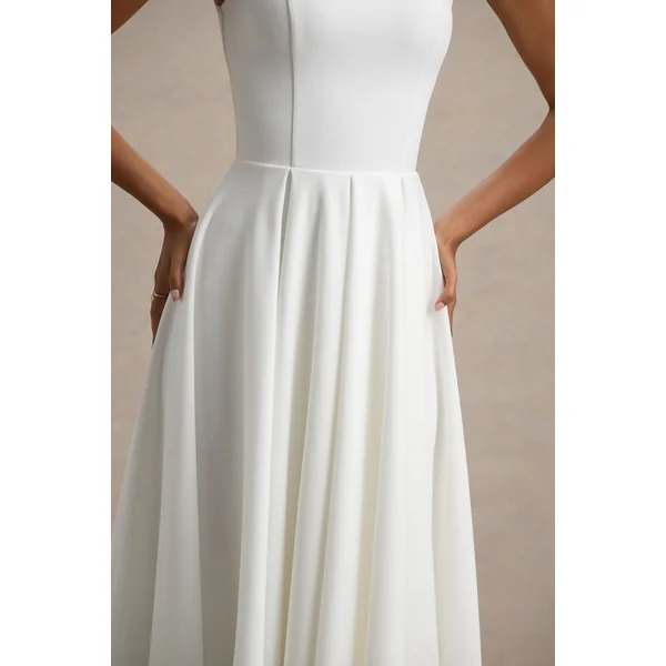 Parina | Robe mi-longue blanche à bretelles et ourlet volumineux