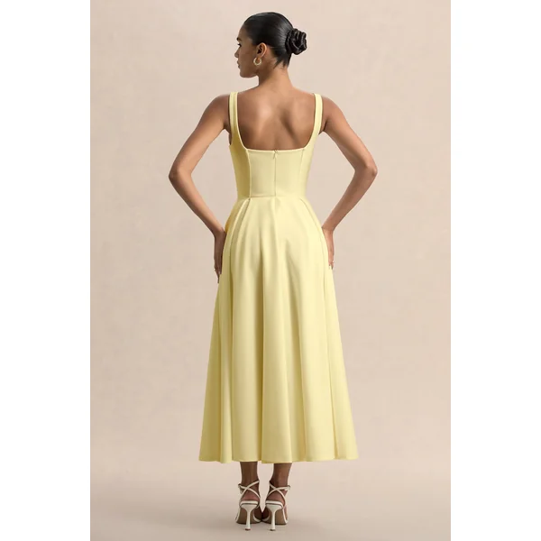 Parina | Robe mi-longue citron à bretelles avec ourlet volumineux