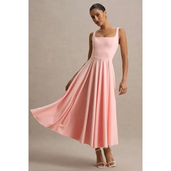 Parina | Robe mi-longue rose à bretelles et ourlet volumineux