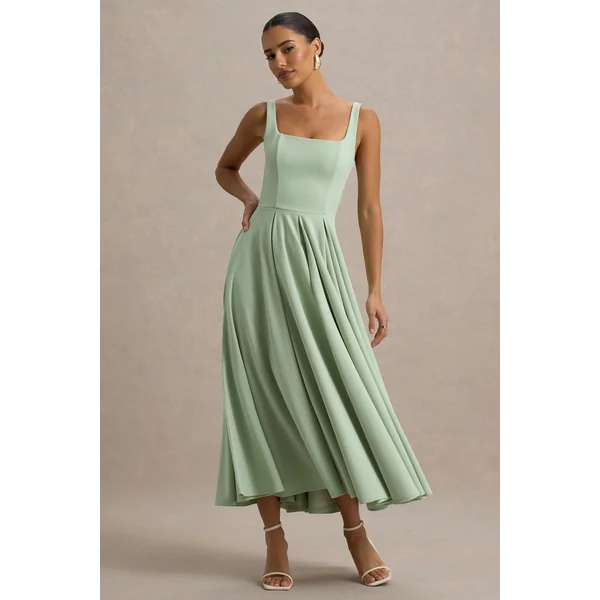 Parina | Robe mi-longue vert clair à bretelles et ourlet volumineux