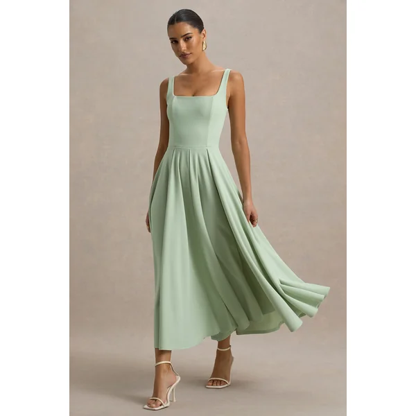 Parina | Robe mi-longue vert clair à bretelles et ourlet volumineux