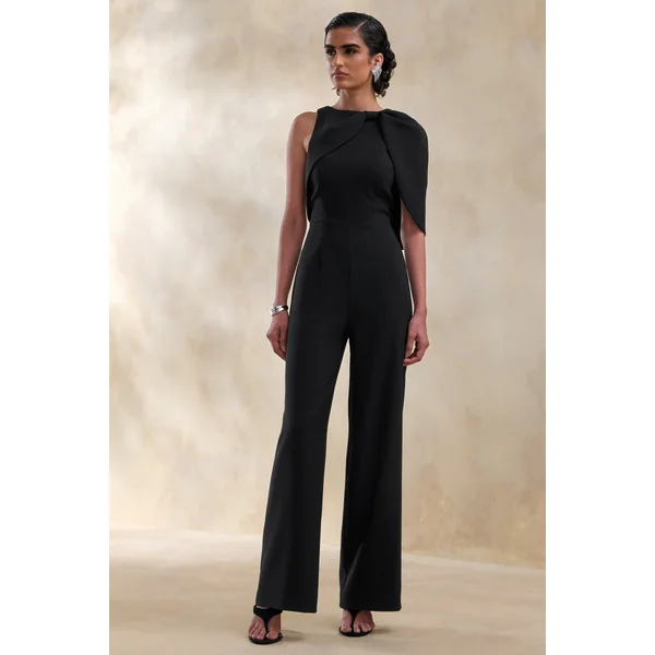 Quinley | Combinaison noire à encolure asymétrique avec manche cape