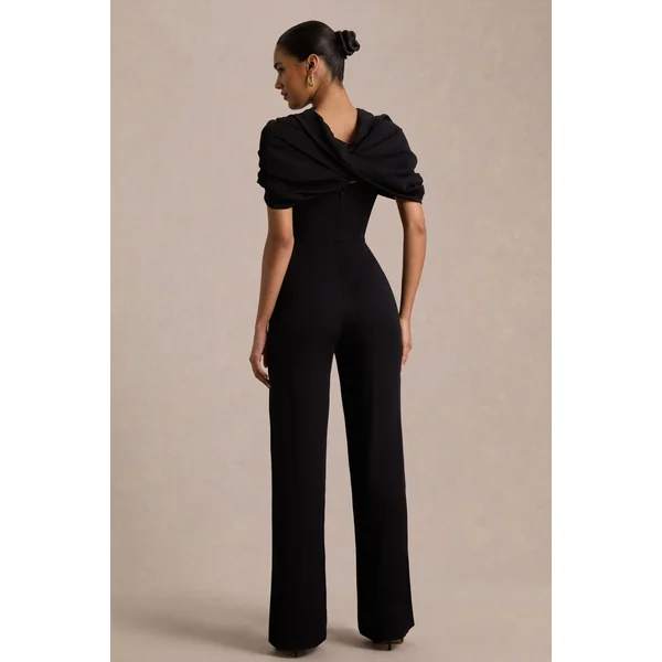 Raquel | Combinaison noire à encolure asymétrique avec drapé
