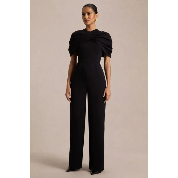 Raquel | Combinaison noire à encolure asymétrique avec drapé