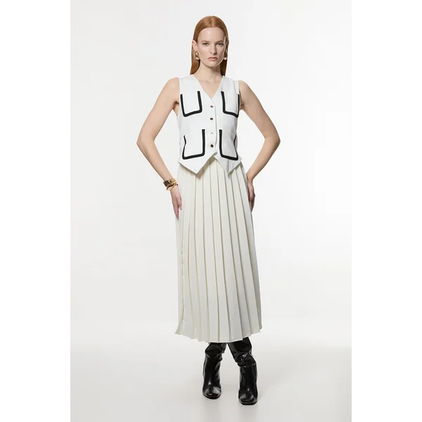 Robe midaxi ajustée sans manches en stretch compact plissée à liseré contrasté.