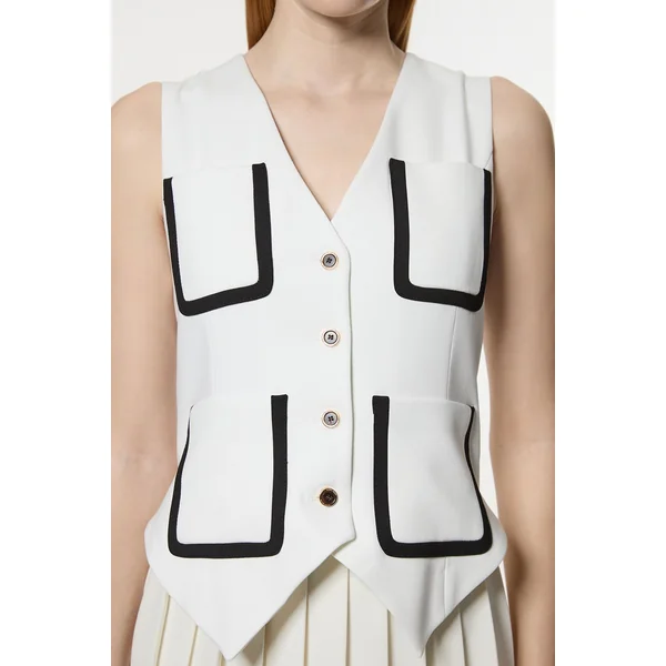 Robe midaxi ajustée sans manches en stretch compact plissée à liseré contrasté.