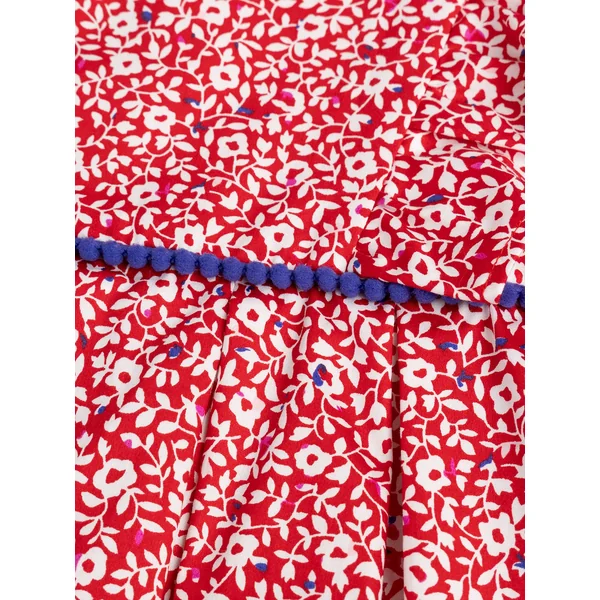 Robe rouge imprimé fleurs blanches - Soins Bébé Naturels & Produits Maman Après Naissance