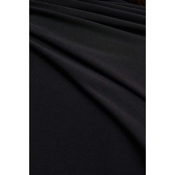 Seema | Combinaison noire à col montant avec cape