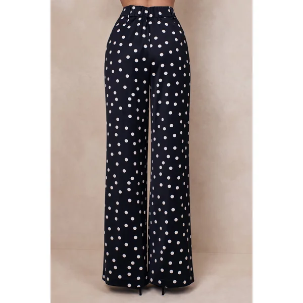 Seloria | Pantalon large en satin à pois noirs et blancs