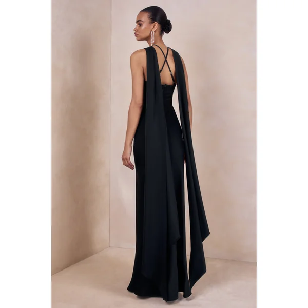 Sloane | Robe longue noire en satin mat à encolure dos-nu avec cape