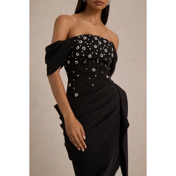 Sylvia | Robe mi-longue noire à encolure bardot ornée à la main avec jupe portefeuille drapée en satin
