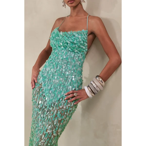 Taryn | Robe longue turquoise à sequins avec encolure drapée et jupe transparente
