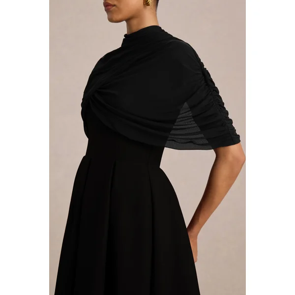 Thalia | Robe mi-longue noire à encolure haute avec cape en mesh transparent
