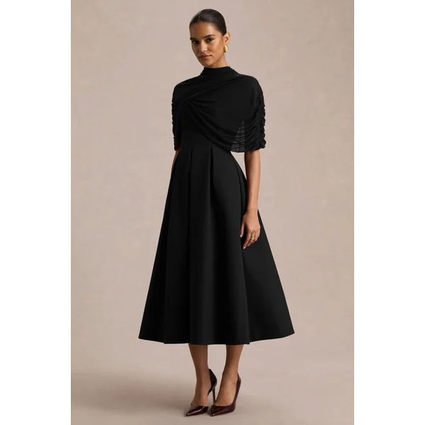 Thalia | Robe mi-longue noire à encolure haute avec cape en mesh transparent