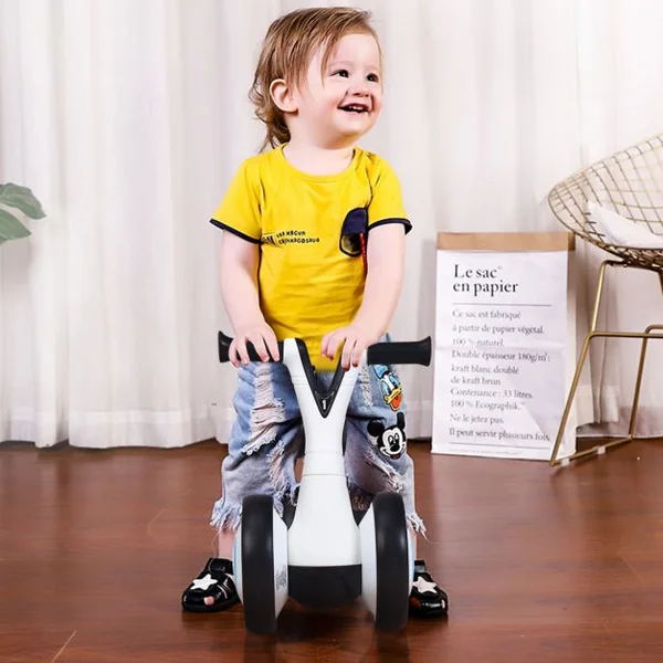 Vélo Trotteur pour Enfant de 12 à 36 mois sans Pédales Guidon Réglable Capacité 20 kg en PP+PVA 59x29x40cm Blanc