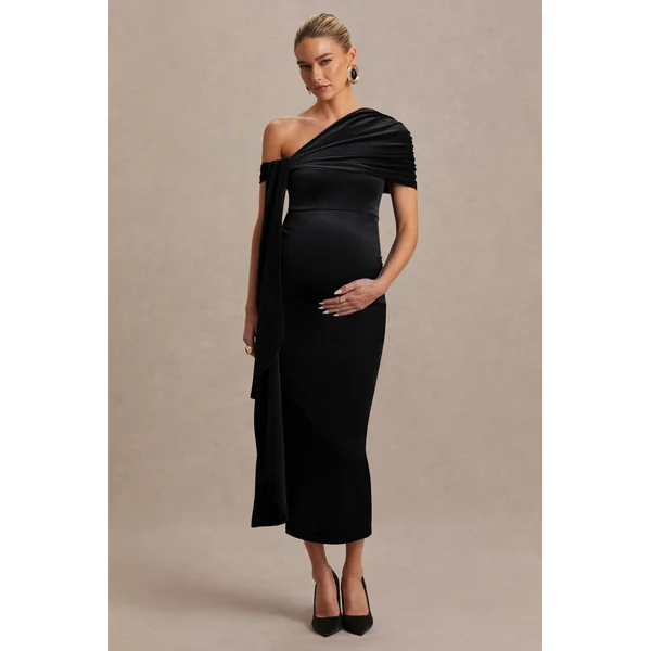 Zena | Robe mi-longue de maternité en velours noir à encolure asymétrique avec détail noué et ceinture
