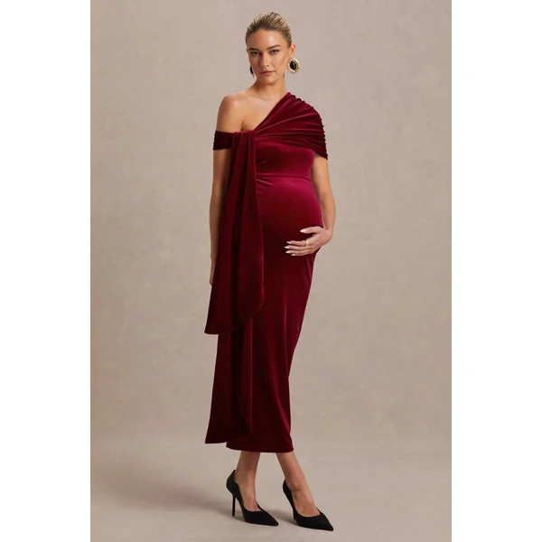 Zena | Robe mi-longue de maternité en velours rouge bordeaux à encolure asymétrique avec détail noué